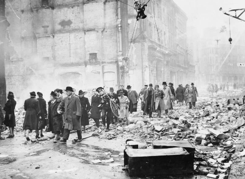 Photo of Londoners going to work after an air raid during the London Blitz