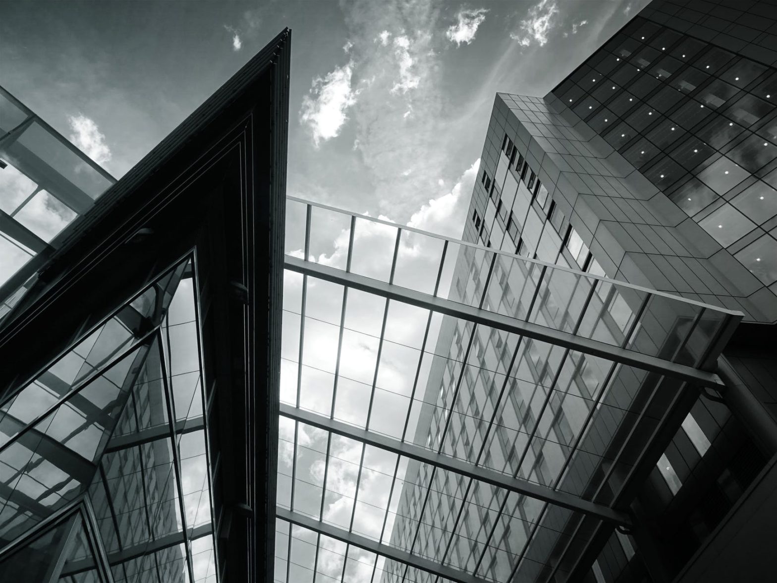 grayscale of glass building